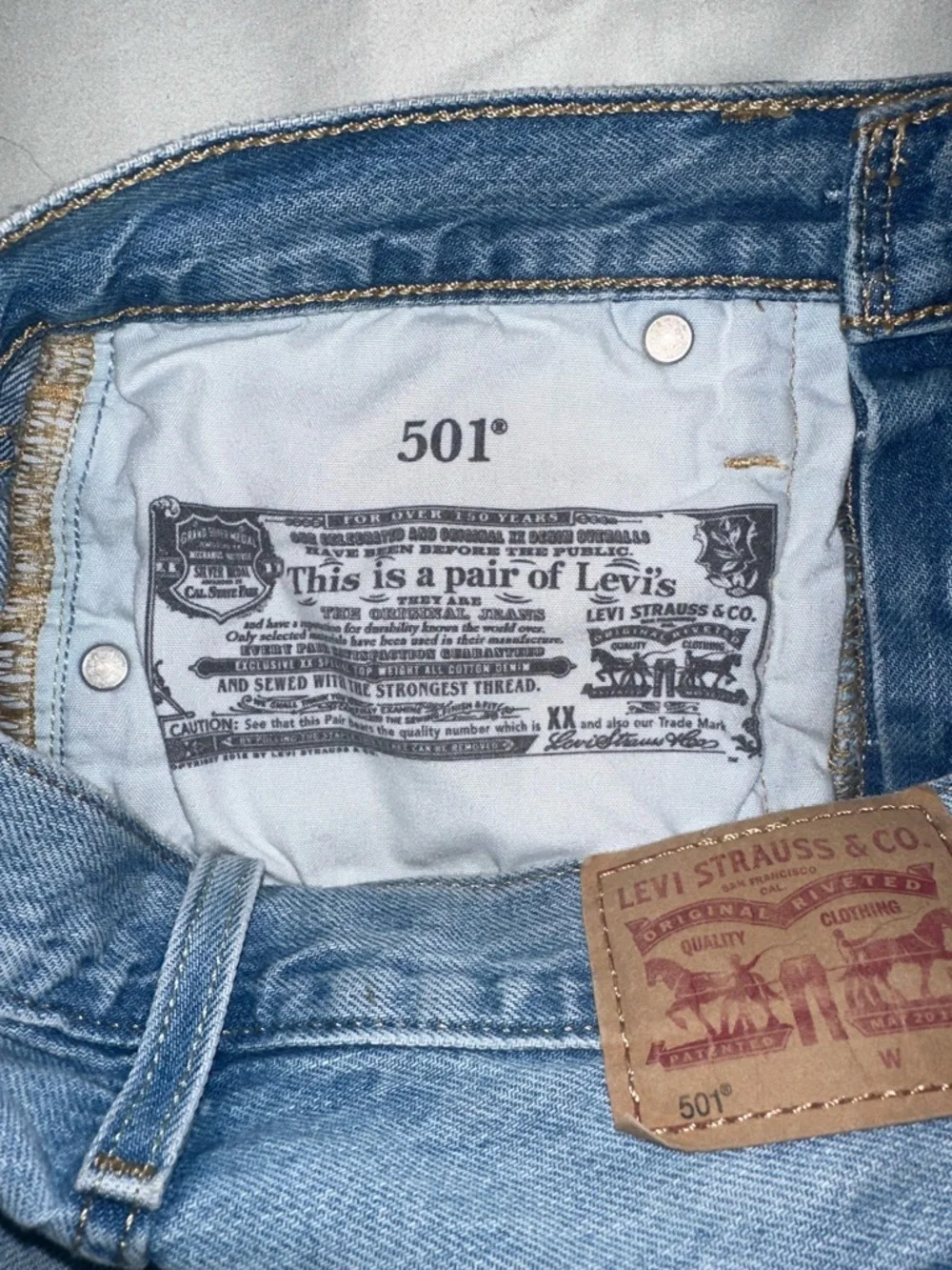 Levi’s Distressed Light Blue Denim Cutoff Shorts - Picture 3 of 3